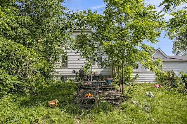 103 Webber St, Battle Creek, MI 49015 - view of yard featuring a wooden deck