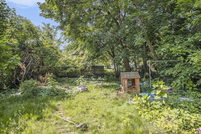 103 Webber St, Battle Creek, MI 49015 - view of yard featuring a storage unit