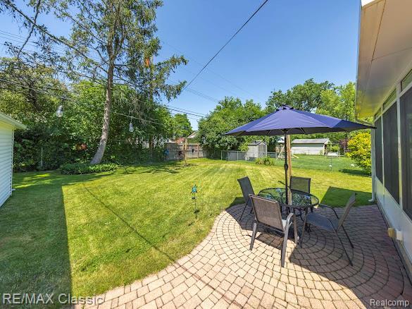 32354 Leelane, Farmington, MI 48336 - view of yard featuring a patio area and outdoor dining area
