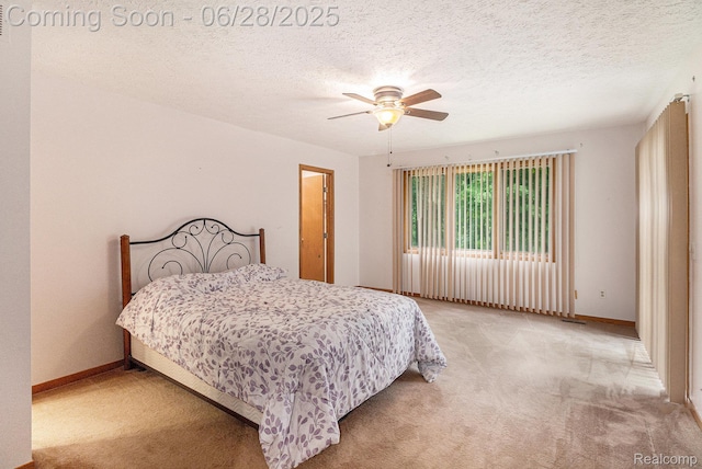 6375 Perryville Rd, Holly, MI 48442 - bedroom featuring light colored carpet, ceiling fan, and a textured ceiling