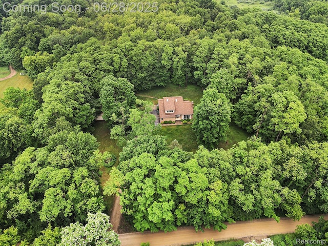 6375 Perryville Rd, Holly, MI 48442 - aerial view of property's location featuring a forest