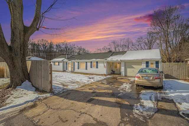 9922 S Sprinkle Rd, Portage, MI 49002 - view of front of home featuring a garage and driveway