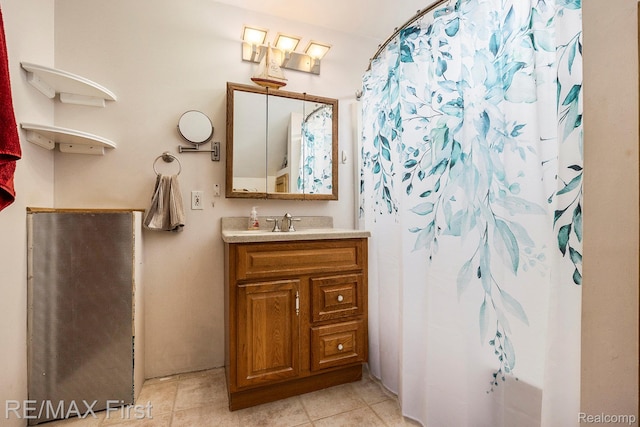 442 Washington St, Marine City, MI 48039 - full bath with vanity, tile patterned floors, and a shower with shower curtain