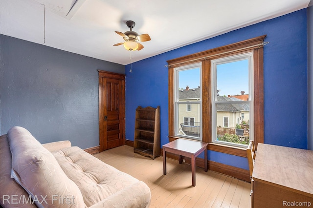 442 Washington St, Marine City, MI 48039 - living area with light wood-type flooring, attic access, and a ceiling fan