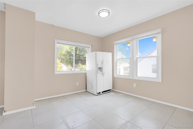 19186 Lamont St, Detroit, MI 48234 - empty room with light tile patterned floors