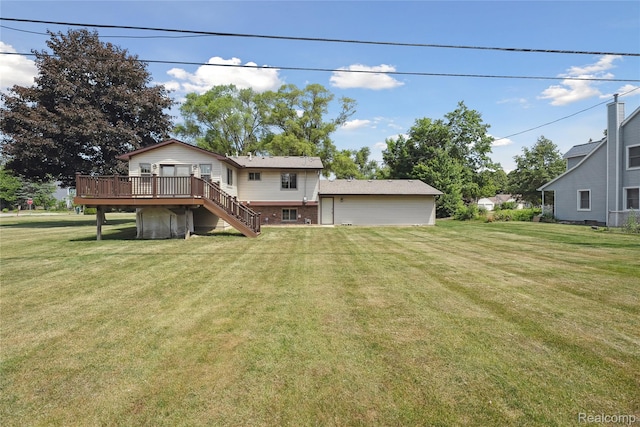 3395 W Maple Rd, Wixom, MI 48393 - back of house with a wooden deck, stairs, and a yard