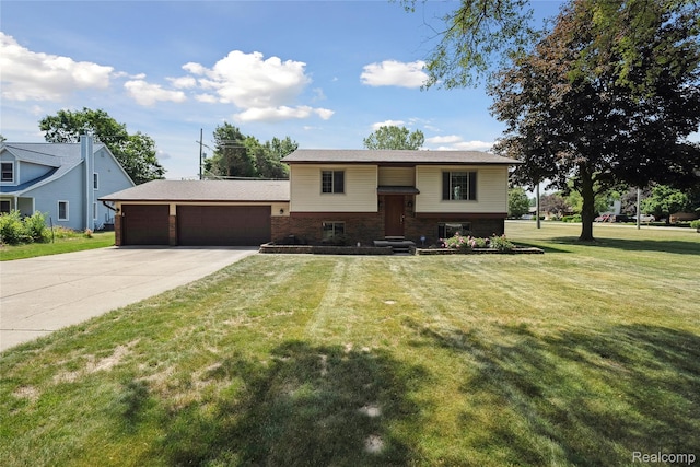 3395 W Maple Rd, Wixom, MI 48393 - split foyer home with a front yard, brick siding, concrete driveway, and a garage