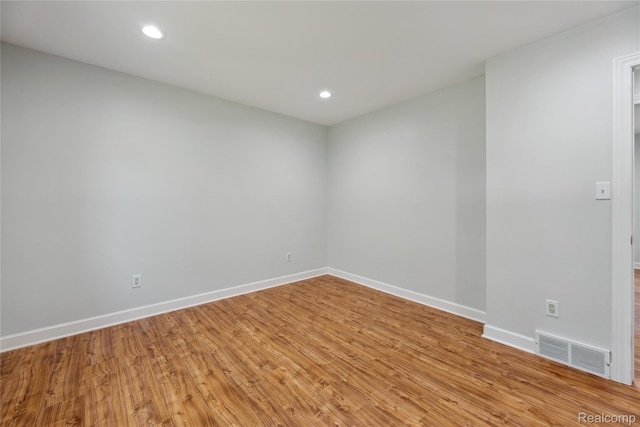 3395 W Maple Rd, Wixom, MI 48393 - spare room featuring light wood finished floors and recessed lighting
