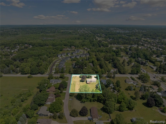 3395 W Maple Rd, Wixom, MI 48393 - view of property location featuring property parcel outlined and a heavily wooded area