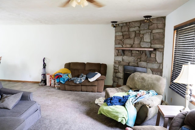181 Spring St, Hillsdale, MI 49242 - living area featuring a ceiling fan and a fireplace