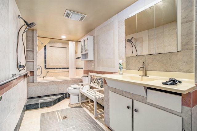 11303 W Dr N, Bellevue, MI 49021 - full bath featuring tile walls, tile patterned floors, vanity, recessed lighting, and tiled shower / bath