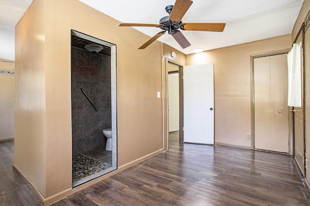 11303 W Dr N, Bellevue, MI 49021 - unfurnished bedroom featuring wood finished floors, connected bathroom, a ceiling fan, and a closet