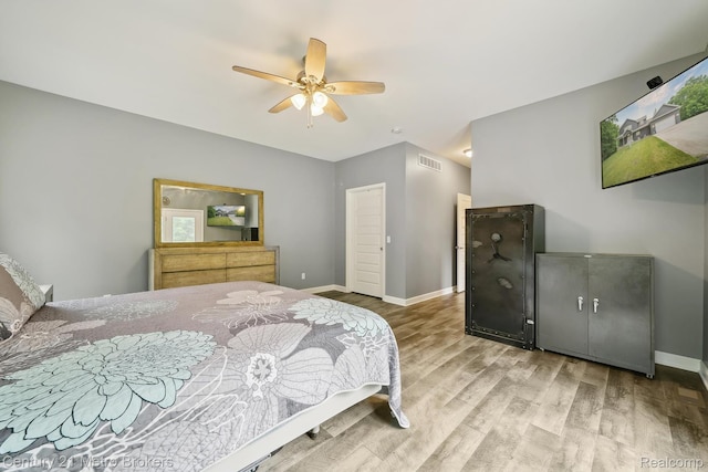9119 Hegel Rd, Goodrich, MI 48438 - bedroom featuring wood finished floors and ceiling fan