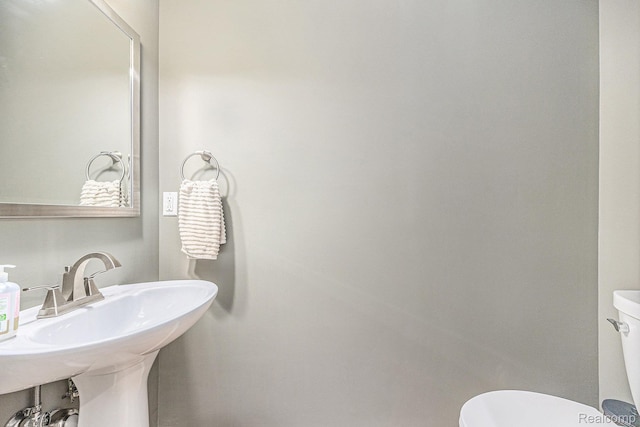 1827 N Franklin Ct, Ann Arbor, MI 48103 - half bath featuring toilet and a sink
