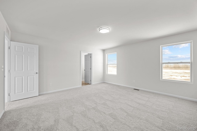 48495 Old Oak Trl, Van Buren, MI 48111 - unfurnished bedroom featuring carpet flooring and baseboards