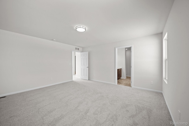 48495 Old Oak Trl, Van Buren, MI 48111 - unfurnished bedroom featuring light carpet and ensuite bath
