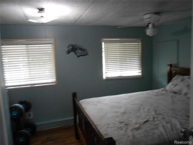 626 Barefoot Ln, Port Sanilac, MI 48469 - bedroom featuring wood finished floors and baseboards