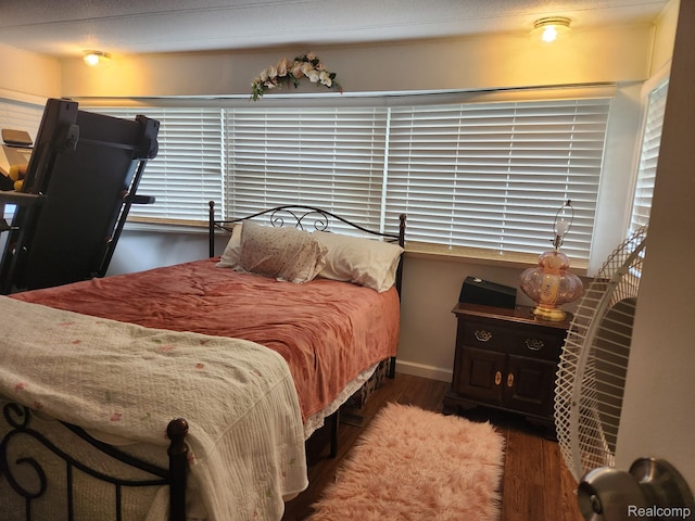 626 Barefoot Ln, Port Sanilac, MI 48469 - bedroom with wood finished floors and baseboards
