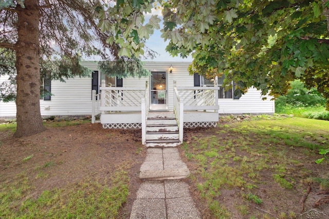 4150 Buzzell Rd, Gladwin, MI 48624 - view of front of property featuring a deck