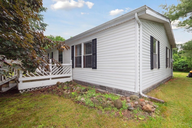4150 Buzzell Rd, Gladwin, MI 48624 - view of property exterior with a yard
