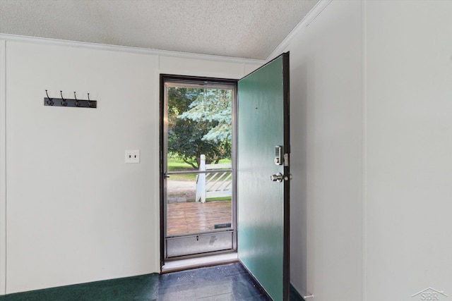 4150 Buzzell Rd, Gladwin, MI 48624 - doorway featuring a textured ceiling