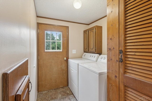4150 Buzzell Rd, Gladwin, MI 48624 - laundry room featuring washer and clothes dryer, cabinet space, a textured ceiling, light stone finish flooring, and crown molding