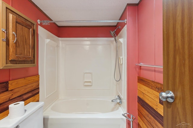 4150 Buzzell Rd, Gladwin, MI 48624 - bathroom featuring bathing tub / shower combination and toilet