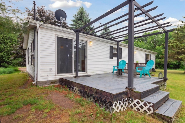 4150 Buzzell Rd, Gladwin, MI 48624 - wooden terrace featuring a pergola and a yard