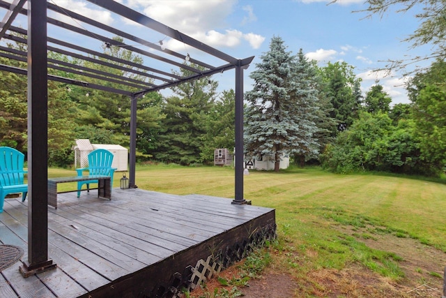 4150 Buzzell Rd, Gladwin, MI 48624 - deck featuring a pergola and a lawn