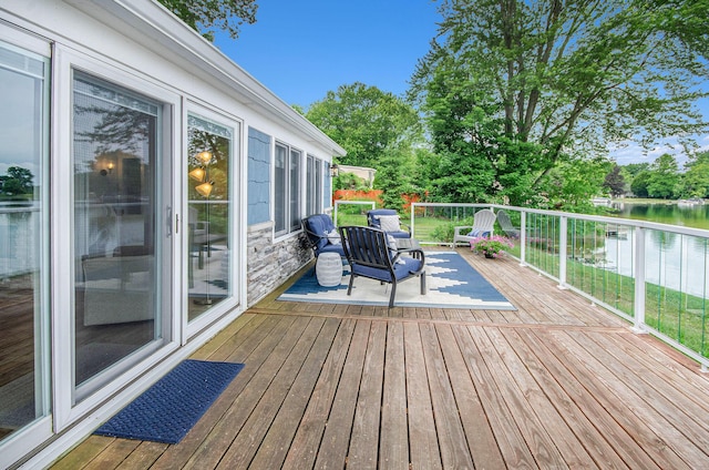 4449 Cordley Lake Rd, Pinckney, MI 48169 - wooden terrace featuring a water view