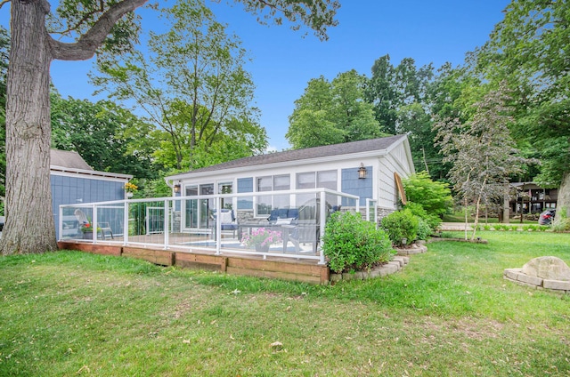 4449 Cordley Lake Rd, Pinckney, MI 48169 - back of property featuring a lawn