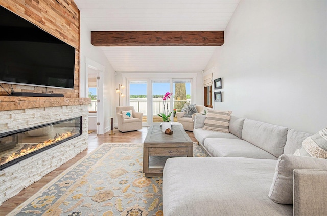 4449 Cordley Lake Rd, Pinckney, MI 48169 - living area featuring a fireplace and wood finished floors