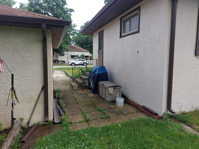 420 N 14th St, Niles, MI 49120 - view of home's exterior with stucco siding