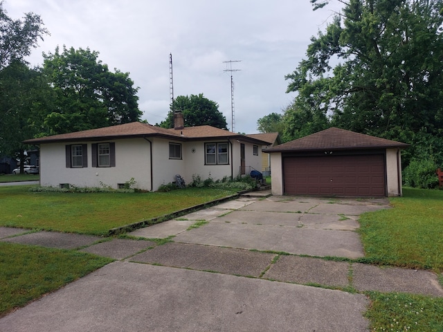 420 N 14th St, Niles, MI 49120 - ranch-style home featuring a garage, a front yard, stucco siding, a chimney, and an outbuilding
