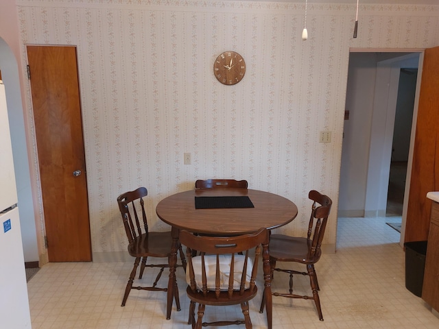 420 N 14th St, Niles, MI 49120 - dining space featuring arched walkways and light floors