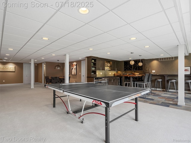 3551 Royal Berkshire Ln, Oakland, MI 48363 - game room with carpet floors, bar with sink, and recessed lighting