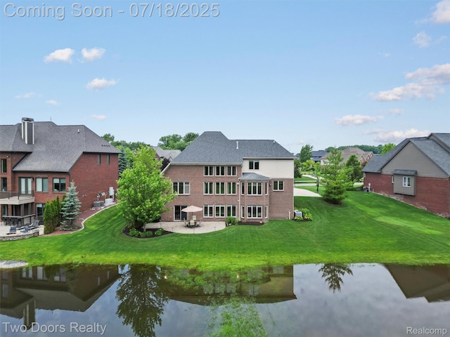 3551 Royal Berkshire Ln, Oakland, MI 48363 - back of house with brick siding, a lawn, a residential view, and a patio area