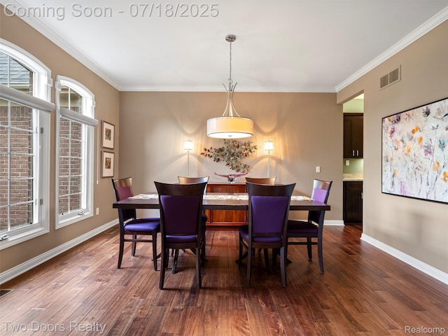 3551 Royal Berkshire Ln, Oakland, MI 48363 - dining space with dark wood-type flooring and ornamental molding
