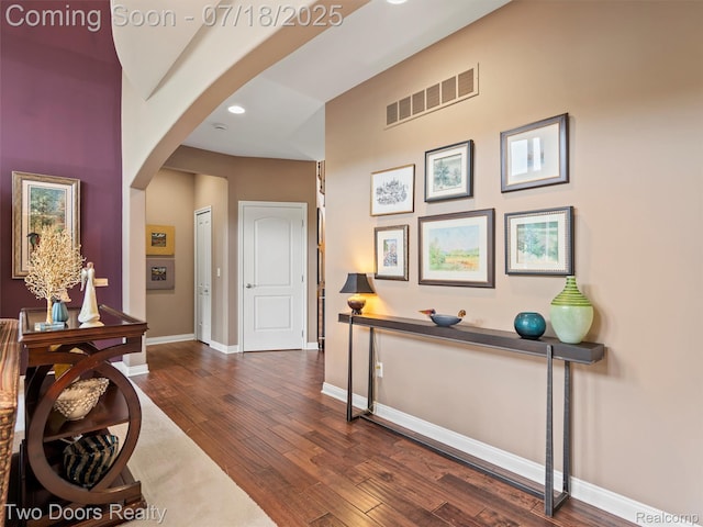 3551 Royal Berkshire Ln, Oakland, MI 48363 - corridor featuring arched walkways, dark wood finished floors, and recessed lighting