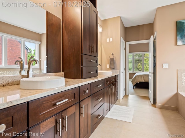 3551 Royal Berkshire Ln, Oakland, MI 48363 - ensuite bathroom with double vanity and tile patterned flooring