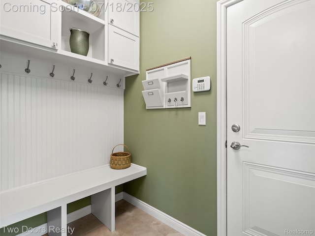 3551 Royal Berkshire Ln, Oakland, MI 48363 - mudroom featuring baseboards and light tile patterned floors