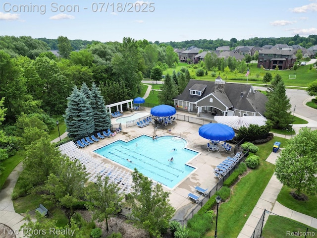 3551 Royal Berkshire Ln, Oakland, MI 48363 - community pool with a patio and a pergola