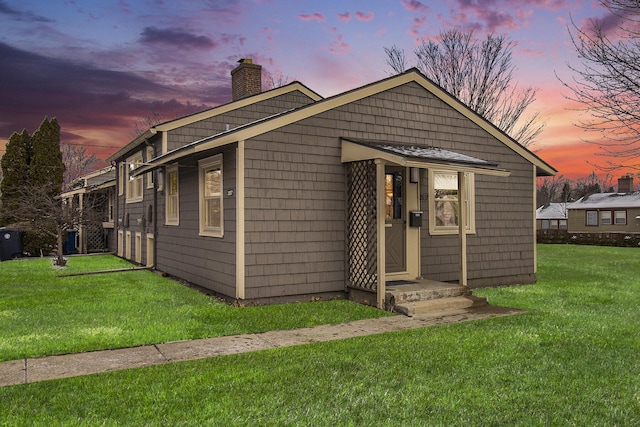 2637 Pittsfield Blvd, Ann Arbor, MI 48104 - bungalow with a chimney and a lawn