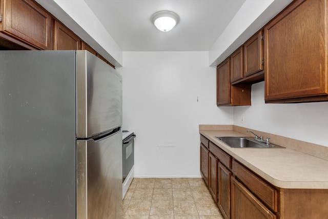 22811 Grove St, Saint Clair Shores, MI 48080 - kitchen featuring freestanding refrigerator, white range with electric stovetop, light countertops, and light tile patterned flooring