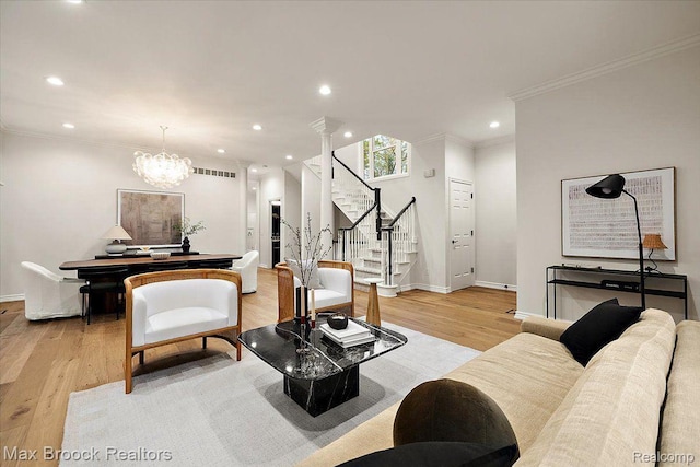 855 Wallace St, Birmingham, MI 48009 - living area featuring stairs, ornamental molding, light wood-style flooring, recessed lighting, and a chandelier
