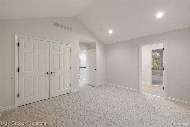 855 Wallace St, Birmingham, MI 48009 - unfurnished bedroom featuring recessed lighting, lofted ceiling, light colored carpet, and a closet