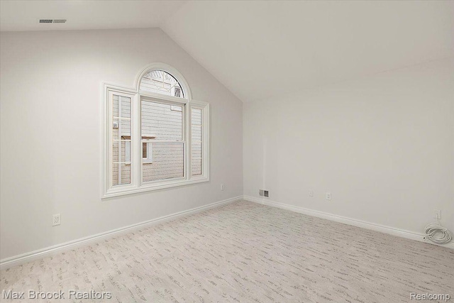 855 Wallace St, Birmingham, MI 48009 - bonus room featuring lofted ceiling and baseboards