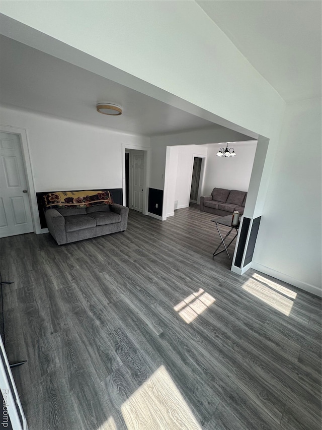 20789 Marie Ave, Warren, MI 48089 - living room featuring dark wood finished floors and a chandelier