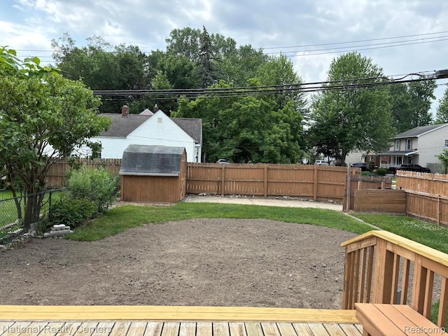 1618 E Lincoln Ave, Royal Oak, MI 48067 - fenced backyard with a storage unit