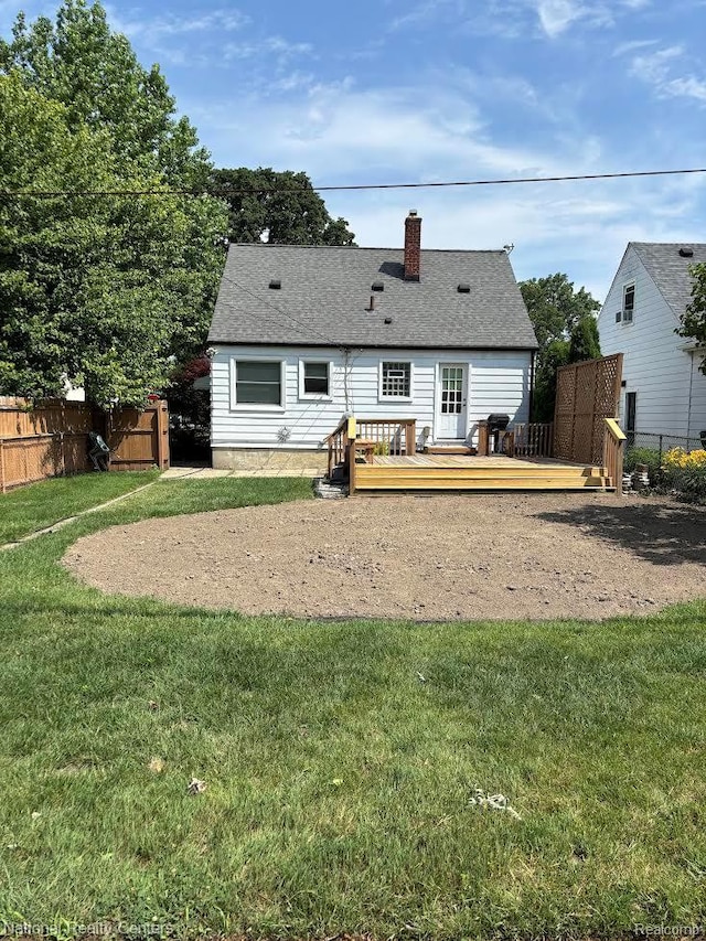 1618 E Lincoln Ave, Royal Oak, MI 48067 - rear view of house with a wooden deck, a chimney, and a shingled roof
